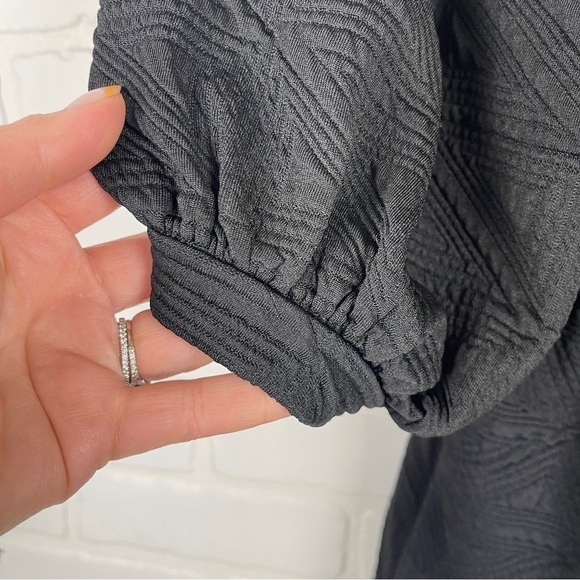 Free People Violet Mini Dress Black Textured Puff sleeve tie back size XS NWT - Picture 9 of 14